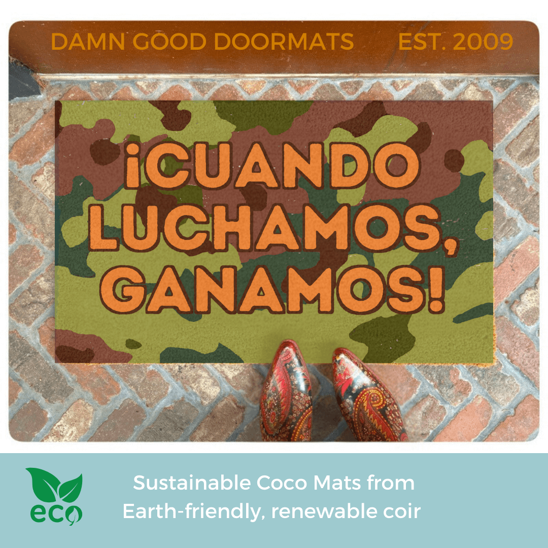 camouflage doormat reading "when we fight we win! in spanish for the Harris Walz 2024 campaign